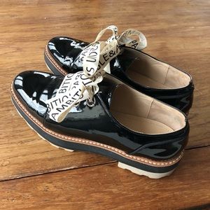 Black patent lace up oxfords